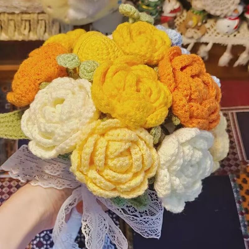 Waterfall bride holds a knitted bouquet of flowers to knit wedding gifts