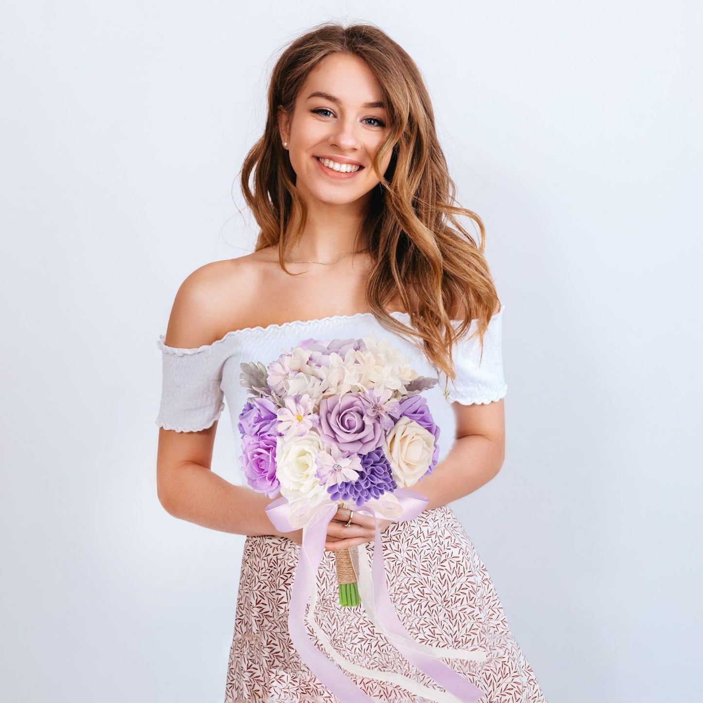 Purple lace ribbon wedding bouquet of roses